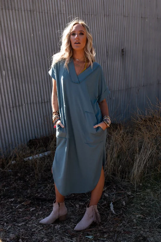 women's business casual dressesThe Nest On The Go Round Hem Pocketed Midi Dress - Teal